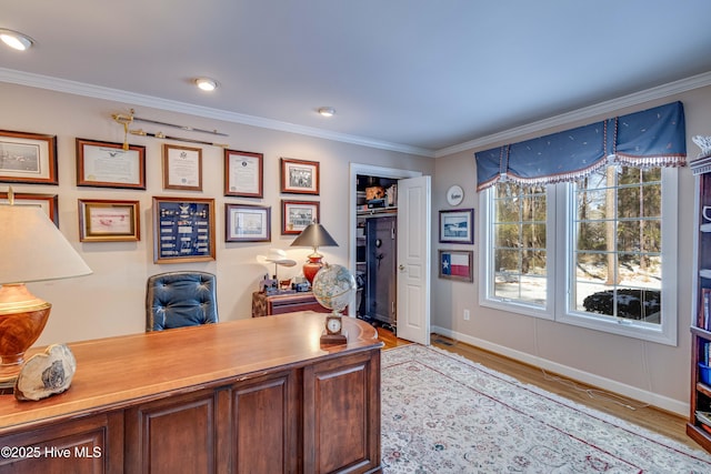 office featuring crown molding and light hardwood / wood-style flooring