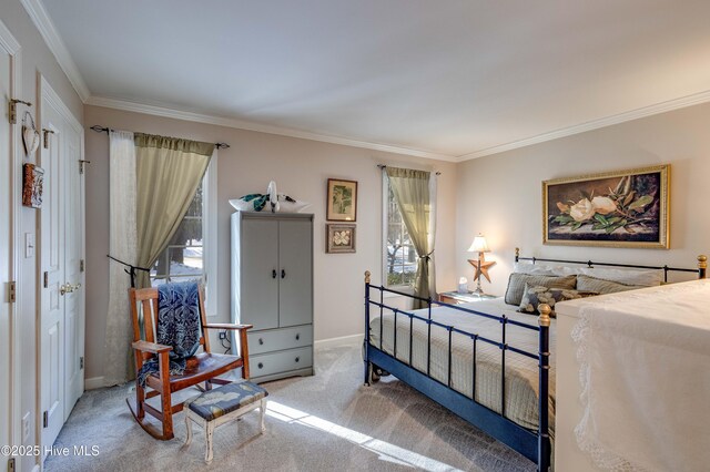 carpeted bedroom featuring crown molding