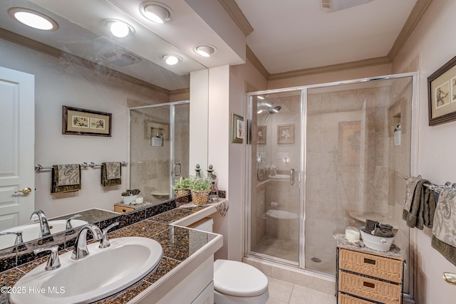 bathroom featuring crown molding, vanity, and a shower with shower door