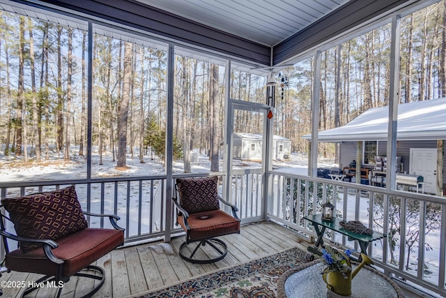 sunroom featuring a healthy amount of sunlight