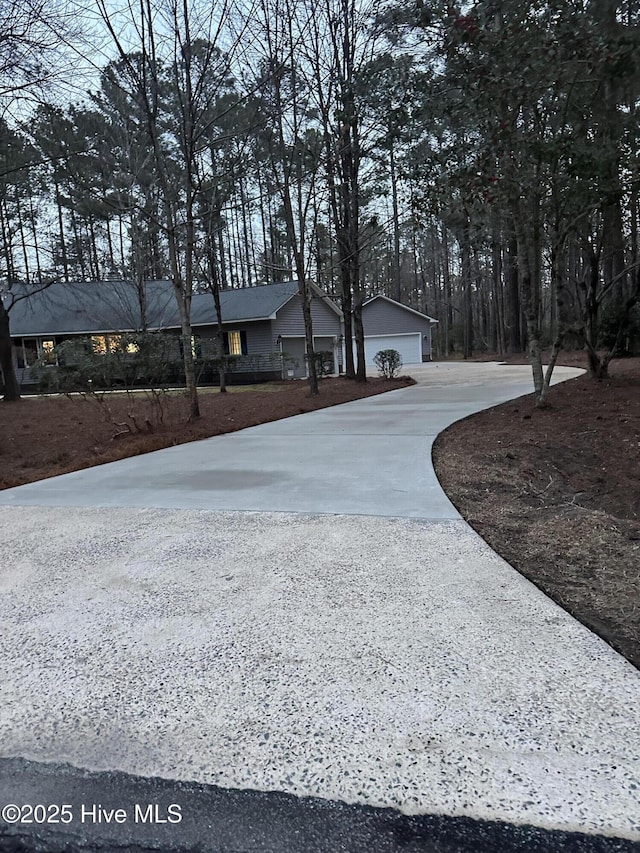 view of yard with a garage