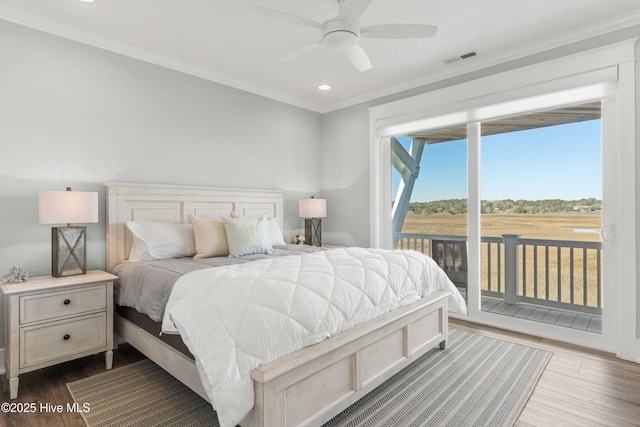 bedroom with ornamental molding, dark wood-type flooring, access to outside, and ceiling fan