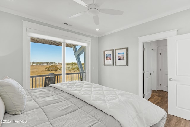 bedroom with ceiling fan, wood-type flooring, ornamental molding, and access to outside