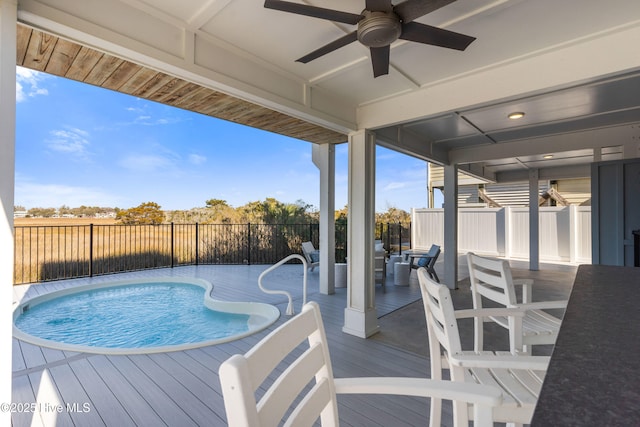 1012 Ocean Blvd W, Holden Beach, NC 28462 - view of pool featuring a deck, a fenced in pool, a ceiling fan, and fence