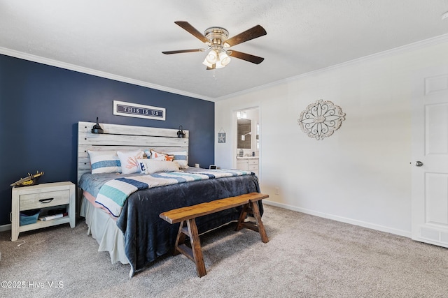 carpeted bedroom featuring ornamental molding, ceiling fan, and ensuite bath