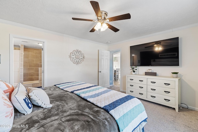 bedroom with ensuite bath, light carpet, a textured ceiling, ornamental molding, and ceiling fan