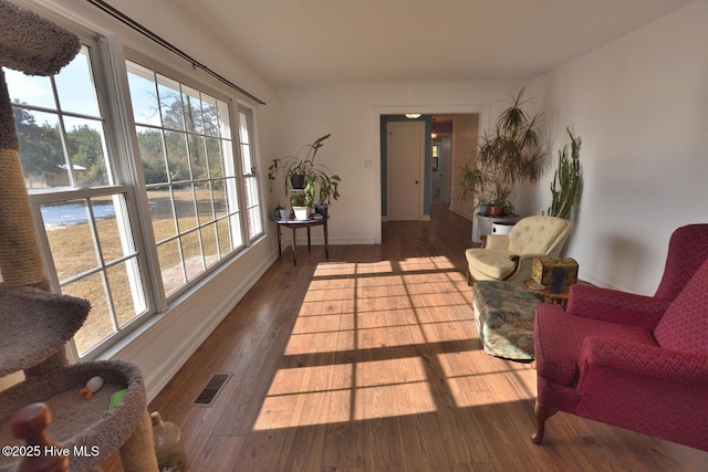 living area featuring hardwood / wood-style flooring