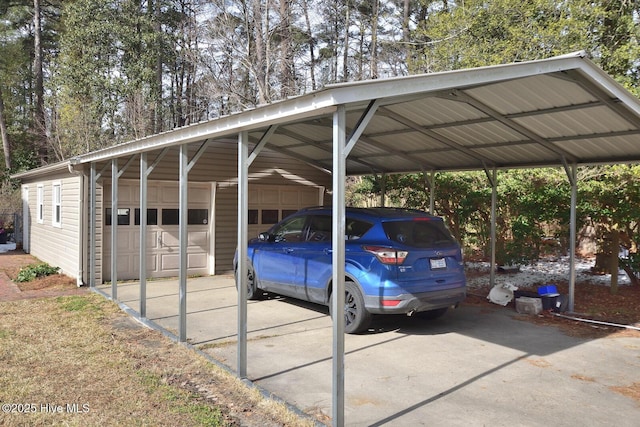 view of parking featuring a carport and a garage