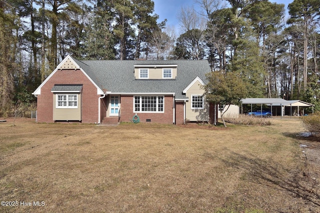 view of front of home featuring a carport and a front lawn