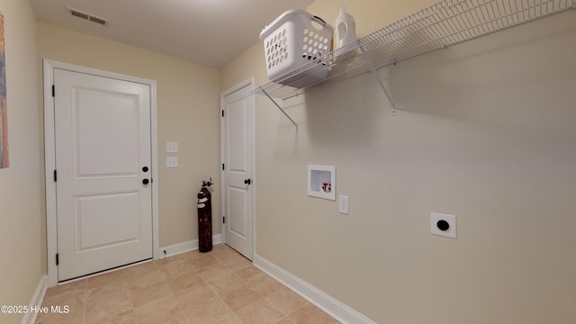 clothes washing area with washer hookup and electric dryer hookup