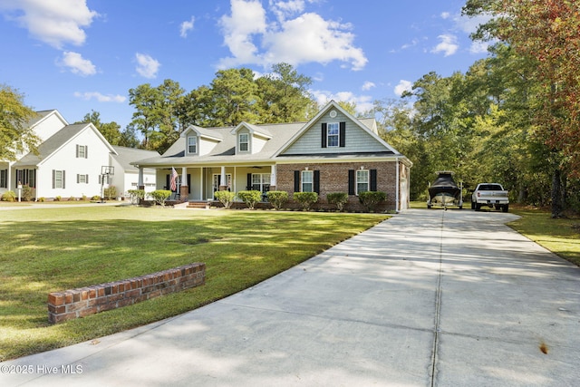 view of front of home featuring a porch and a front lawn