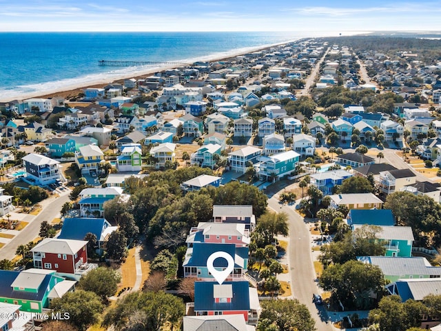 aerial view featuring a water view and a view of the beach