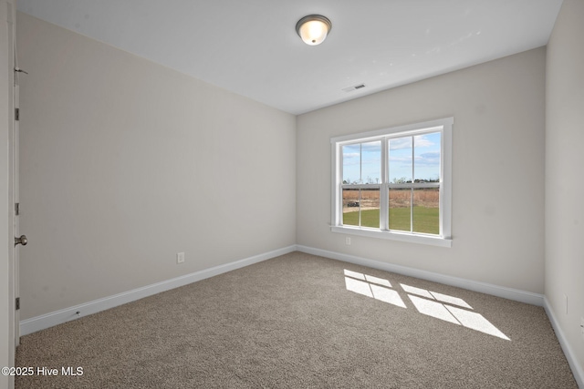 view of carpeted spare room