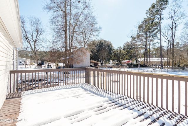 view of snow covered deck