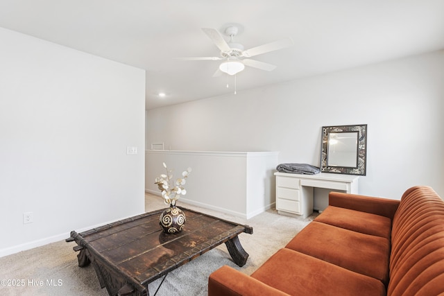 living room with light colored carpet and ceiling fan