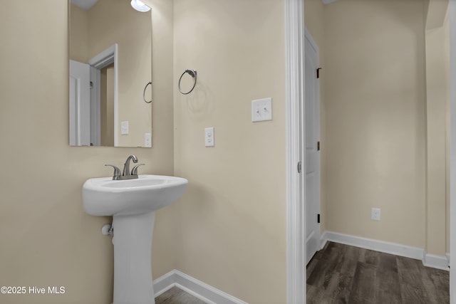 bathroom featuring hardwood / wood-style flooring