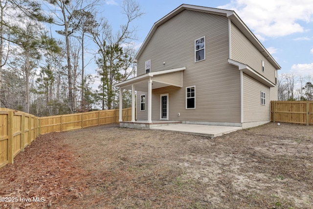 rear view of property with a patio