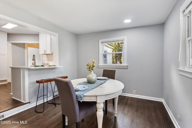 dining room featuring dark hardwood / wood-style floors