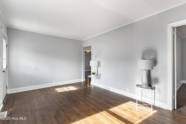 interior space featuring crown molding and dark hardwood / wood-style floors