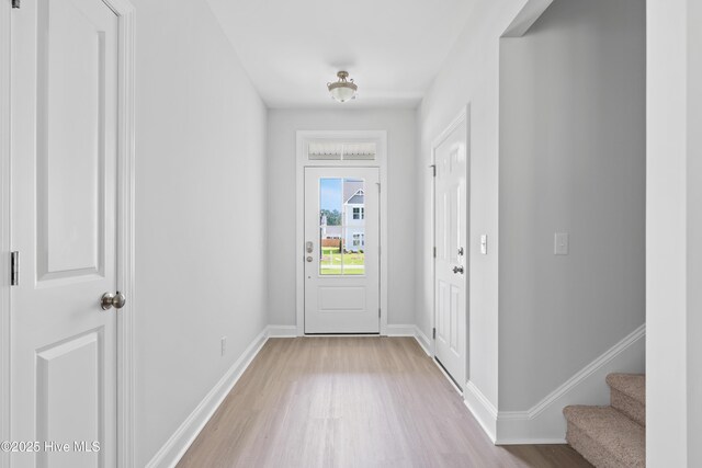 entrance foyer featuring light hardwood / wood-style floors