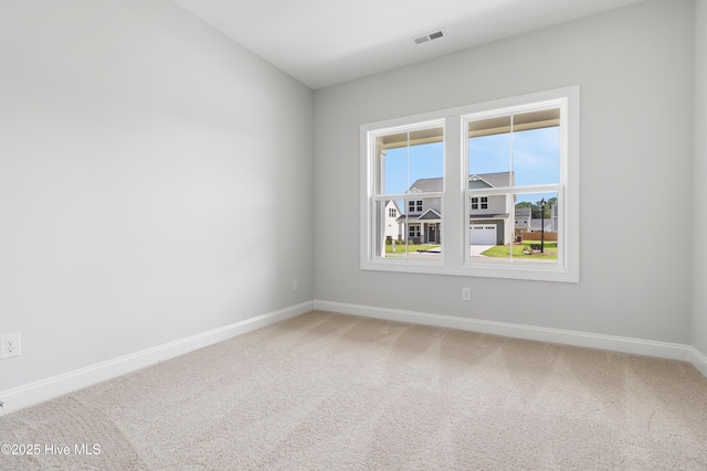 view of carpeted spare room