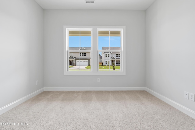 spare room with carpet flooring