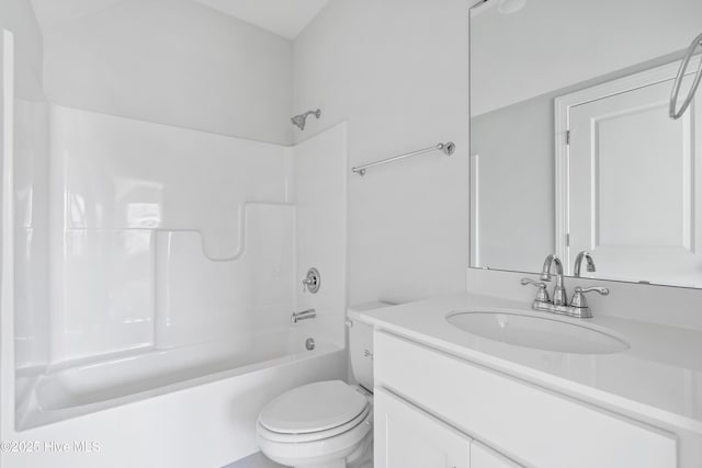 full bathroom with vanity, shower / washtub combination, and toilet