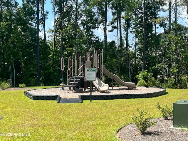 view of playground featuring a lawn