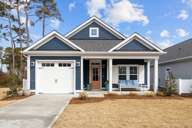 craftsman-style home with a garage and a porch