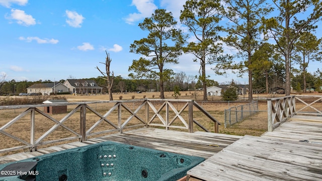 view of swimming pool with a deck