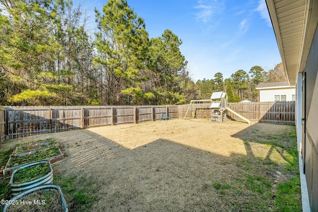 view of yard with a playground