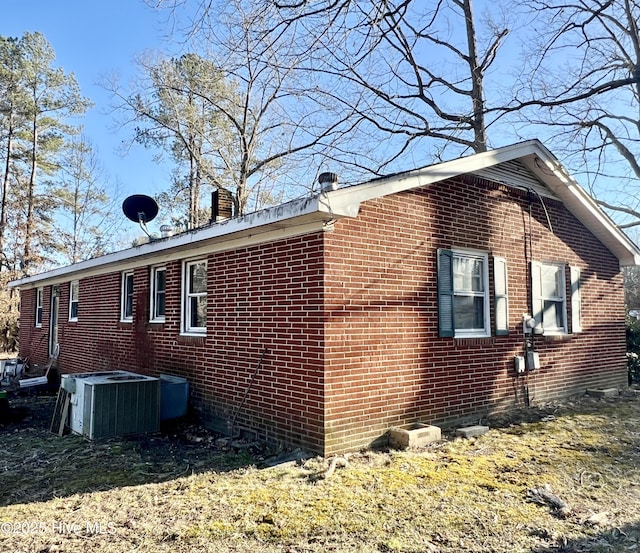 view of property exterior featuring central AC unit