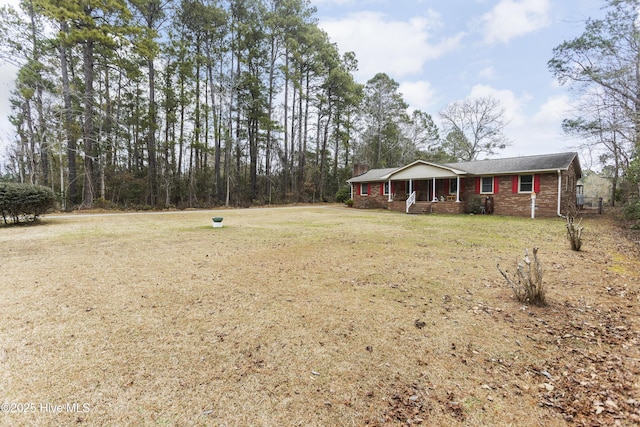 view of yard with a porch