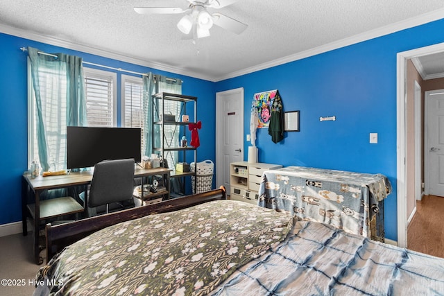 bedroom with crown molding, a textured ceiling, and ceiling fan