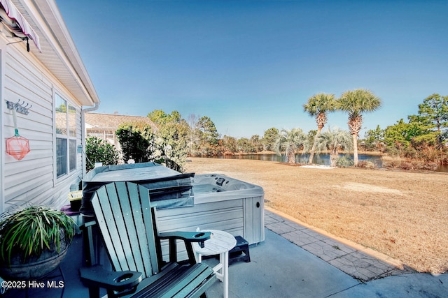 view of patio / terrace featuring a hot tub