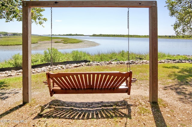 exterior space with a water view