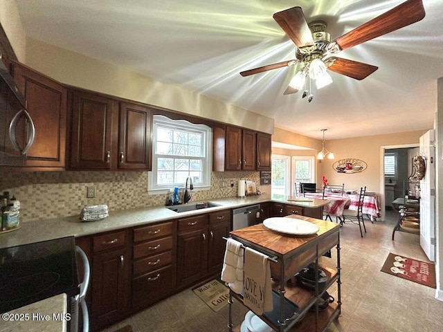 kitchen with decorative light fixtures, sink, decorative backsplash, stainless steel dishwasher, and dark brown cabinetry