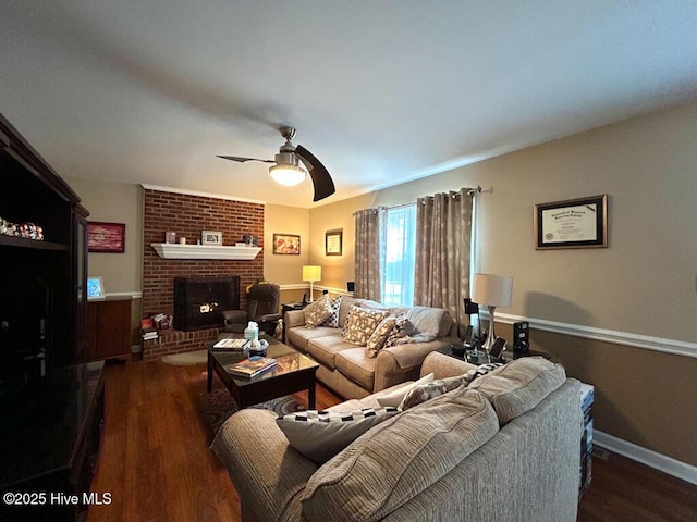 living room with ceiling fan, dark wood-type flooring, and a fireplace