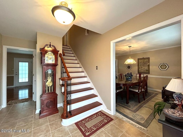 stairs featuring tile patterned flooring