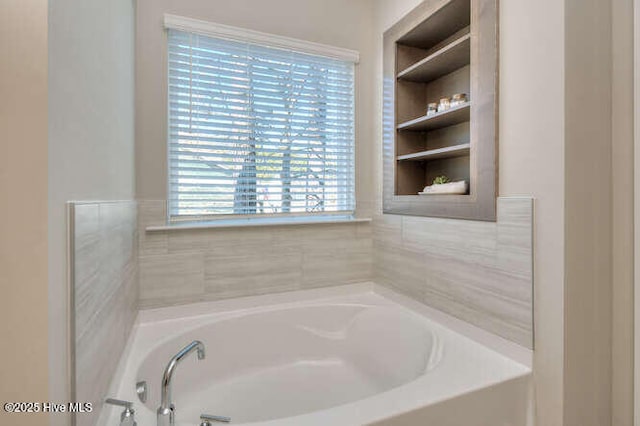 bathroom featuring a bathing tub