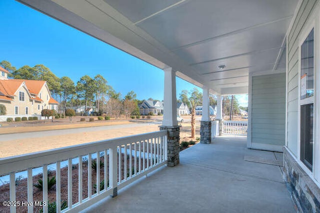 view of patio featuring a porch