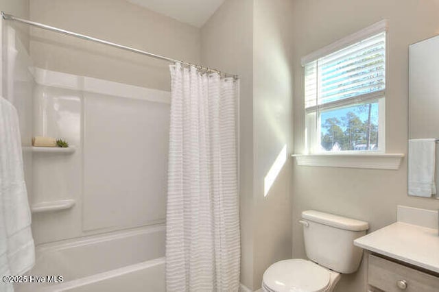 full bathroom with vanity, shower / bathtub combination with curtain, and toilet