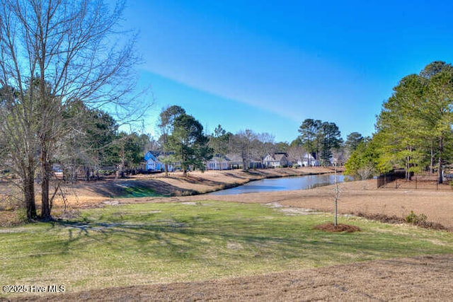 view of yard featuring a water view