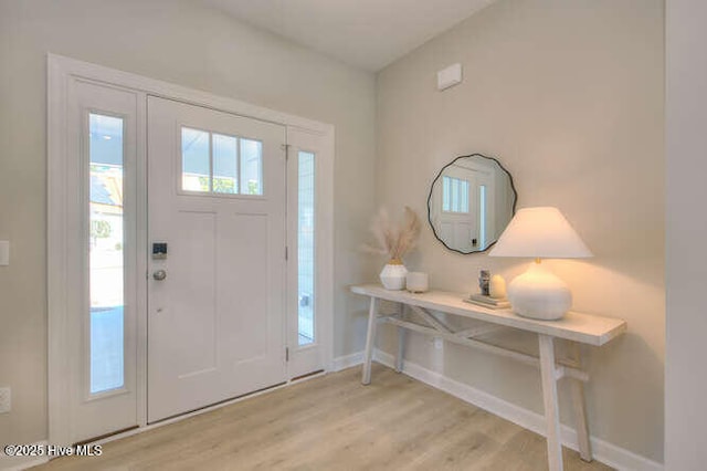 foyer entrance featuring light wood-type flooring