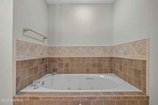 bathroom featuring tiled tub