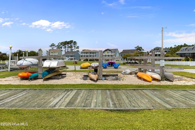 view of play area with a residential view