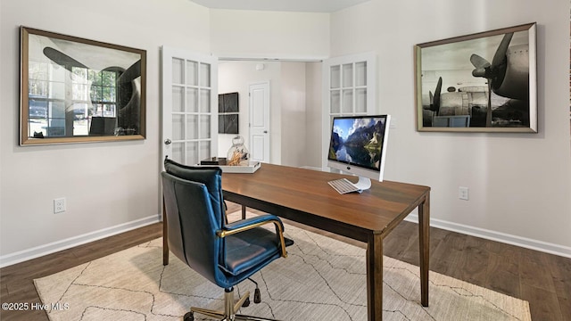 office space with hardwood / wood-style floors