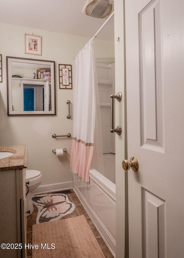 full bathroom featuring shower / tub combo with curtain, vanity, toilet, and tile patterned flooring