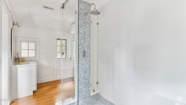 bathroom featuring an enclosed shower