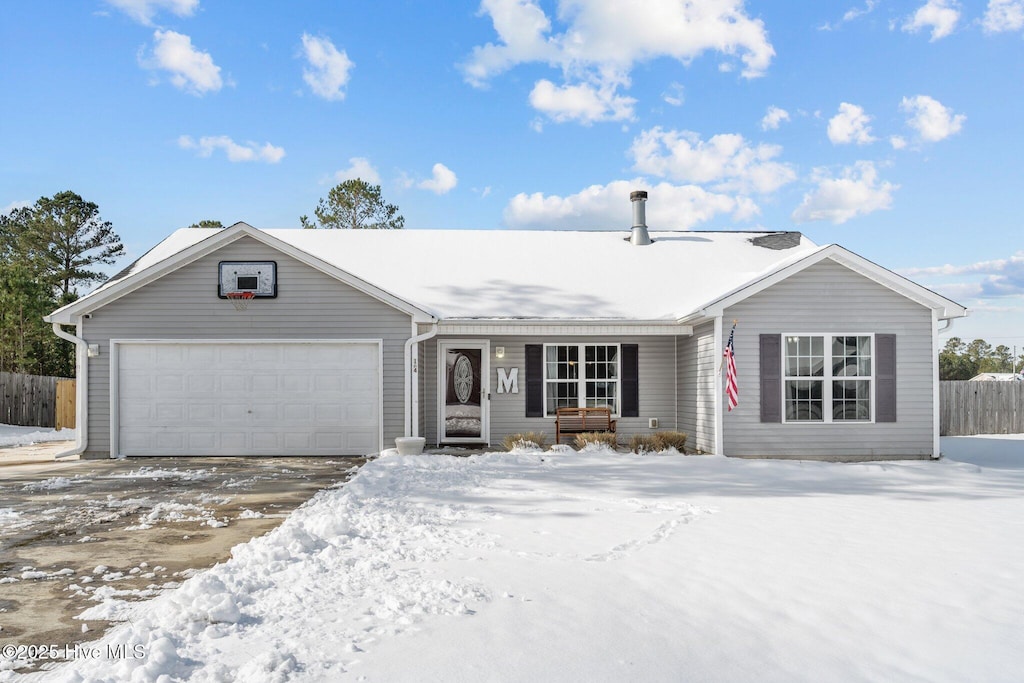 ranch-style home with a garage